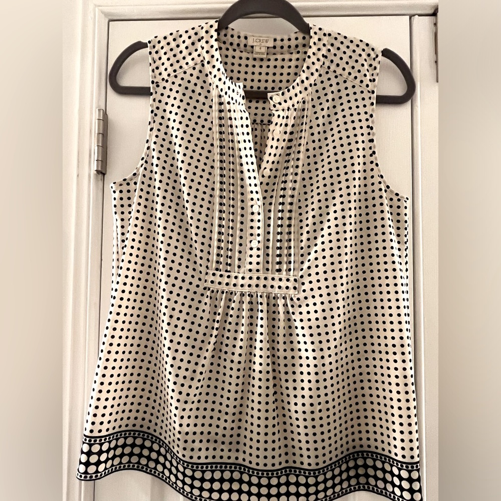 NWOT JCrew 100% polyester sleeveless blouse. Size 4.
